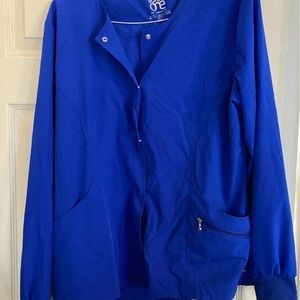 Large barco one scrub jacket. Only wore handful of times. Cobalt is the color